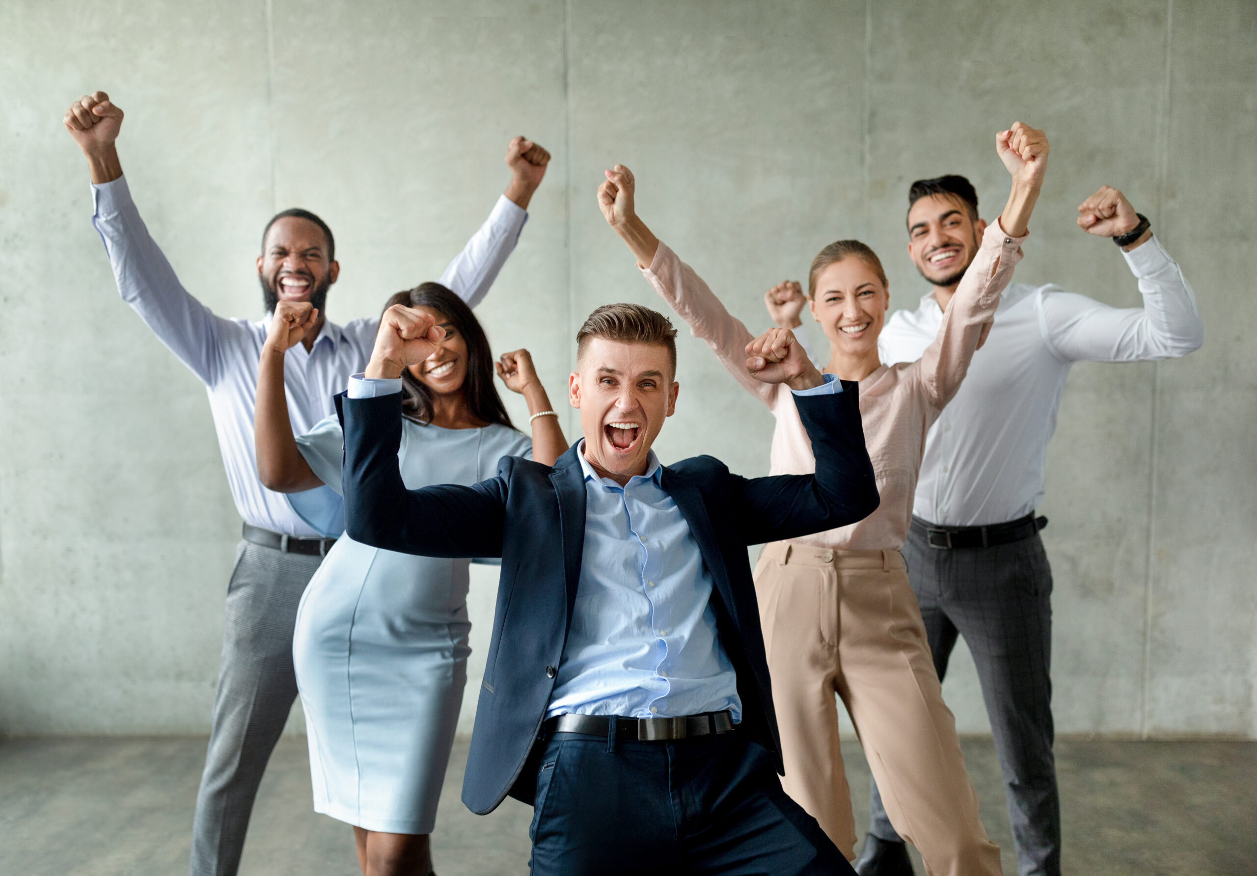 A group of positive individuals enjoying team success
